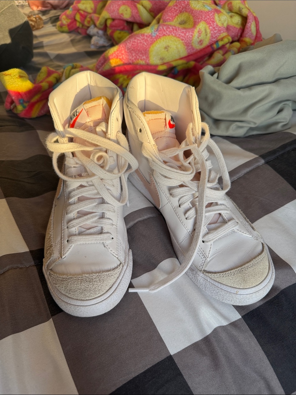 Nike White High-Top Sneakers with Orange Swoosh Accent
